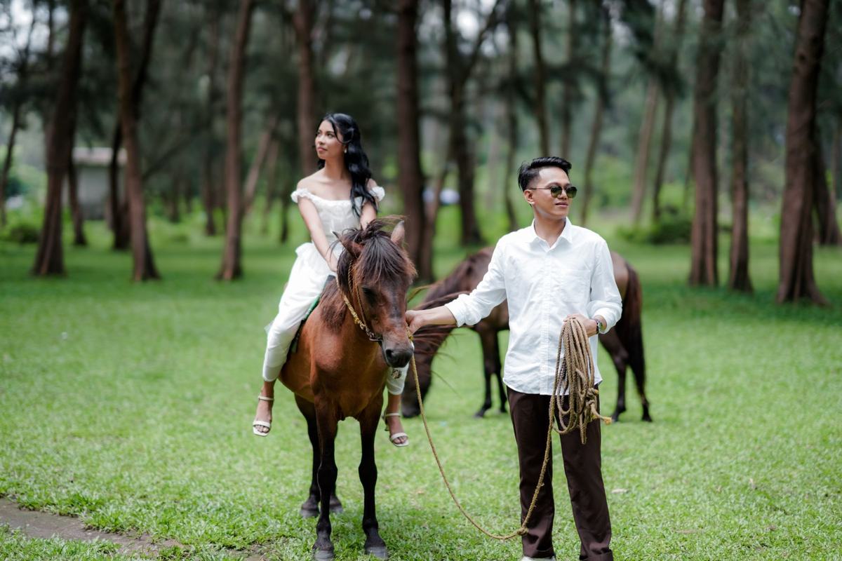 Mary on horseback with Nigel beside her